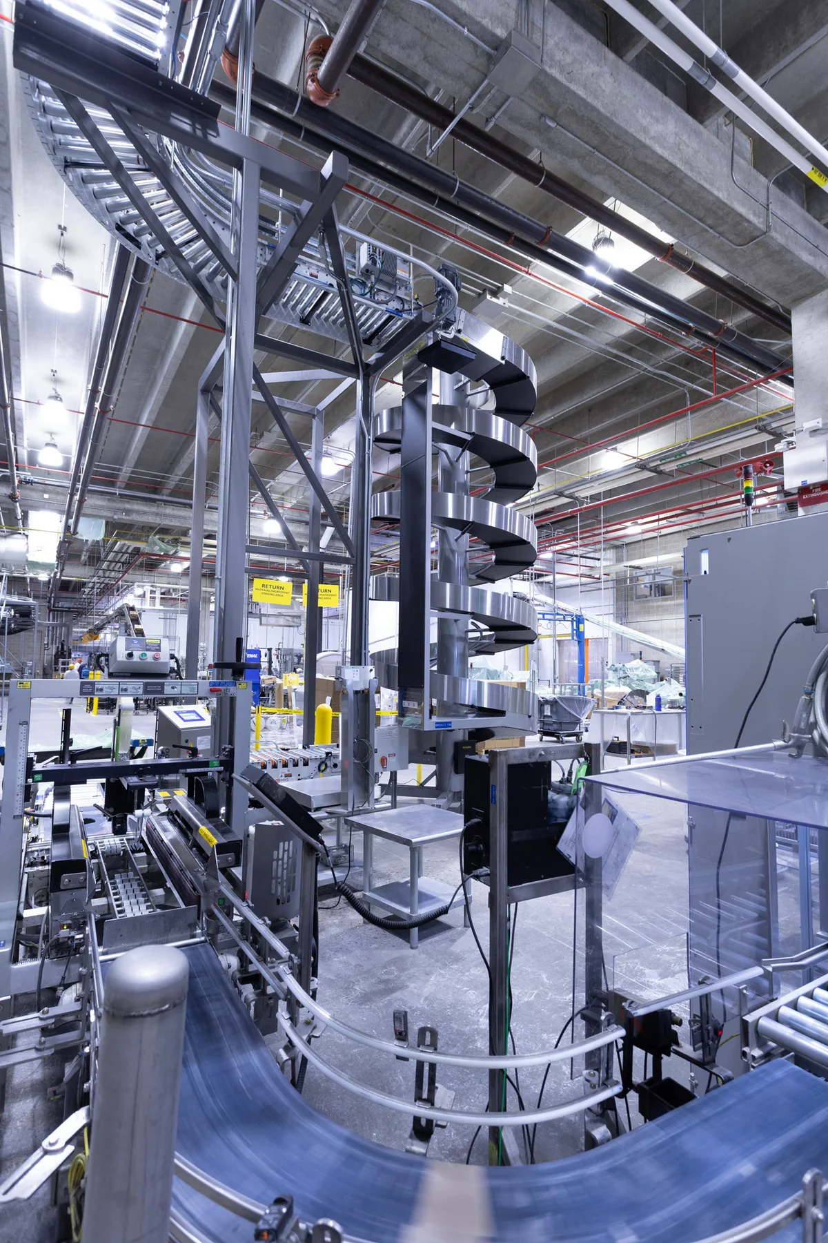 Electrical equipment and piping inside a General Mills food processing facility.