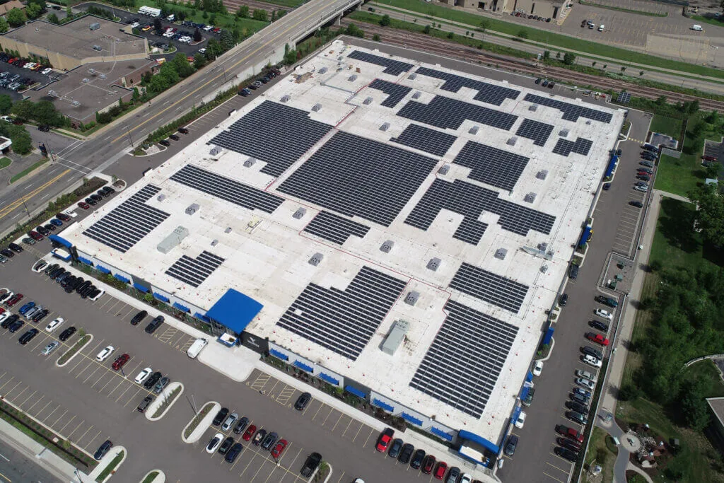 Aerial view of solar panels covering the Vomela rooftop.