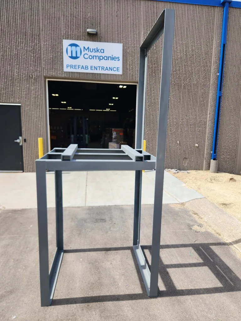 Entrance to Muska Companies' dedicated pre-fabrication facility, with the Muska Prefab Entrance sign above the open doorway.