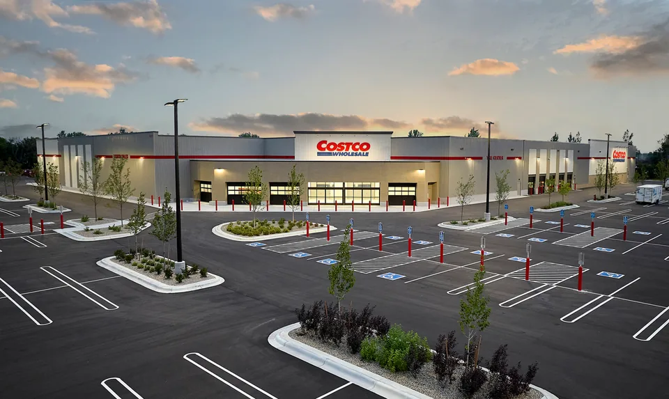 Exterior of the Costco Otsego retail store at dusk.